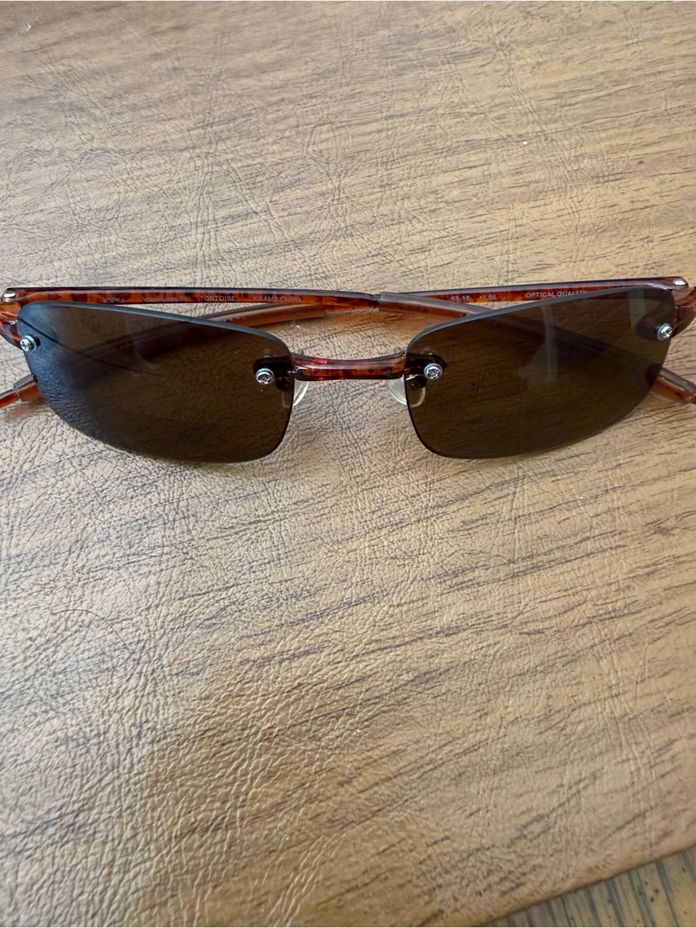 REM Visualites 61 reading glasses tortoiseshell-colored temple arms, rimless